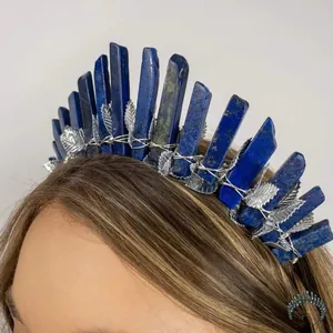 Detail of silver leaf headband featuring raw lapis lazuli stones on a fashion model