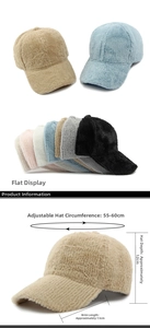 Detailed view of plush baseball caps showing adjustable straps and soft ribbed texture