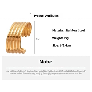 Detailed view of wide gold stainless steel cuff bracelet with 6cm height and 39g weight