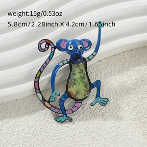Close-up of a colorful monkey enamel brooch with floral patterns and 15g weight details