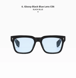 Detail of square black sunglasses with light blue lenses and silver diamond accents