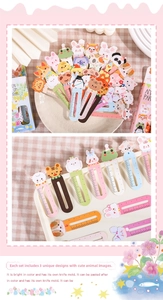 Detail of 30 unique animal cartoon ruler bookmarks with 5cm scale on pink plaid background