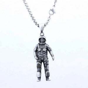 Minimalist astronaut pendant necklace in vintage stainless steel with box chain detail