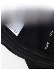 Detail view of the interior sweatband and reinforced stitching on a cotton baseball cap