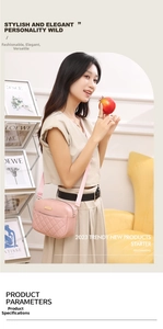 Pink quilted crossbody bag with gold metal plate detail worn by a model in casual setting