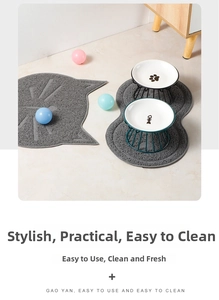 Close-up of white ceramic cat bowls with patterns on a high elevated metal stand