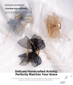 Detailed set of mesh bow hair claws with elegant pearl tassel pendants in three colors