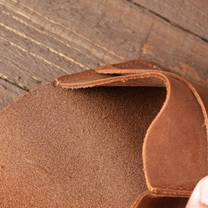 Slim handmade brown crazy horse leather card holder with textured internal fiber finish