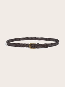 Close-up of a woven dark brown belt with vintage brass buckle on neutral background