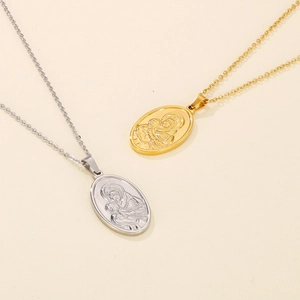 Detail of oval Virgin Mary and Child embossed pendants in gold and silver finish
