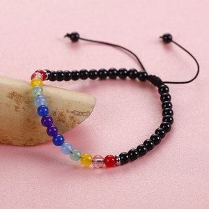Adjustable seven chakra energy bracelet with natural colorful beads and black woven cord