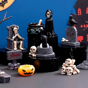 Miniature Halloween resin figurine set including skull throne, cauldron and gravestone