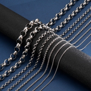 Detail showing various sizes of polished silver stainless steel round link chains on display