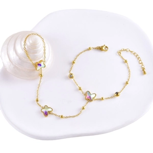 Elegant gold butterfly hand chain bracelet with iridescent charms and rhinestone accents