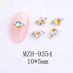 Detailed view of AB crystal heart nail art charms with wings, size 10x5mm for manicure