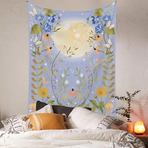 Bohemian floral moon phase tapestry with hand-drawn moth and butterfly over bed