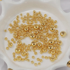 Macro de perles d'espacement plaquées or 18 carats de différentes tailles pour bijoux DIY