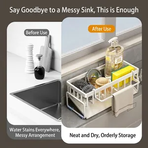 White kitchen sink organizer rack with drainage tray and towel bar for sponge storage