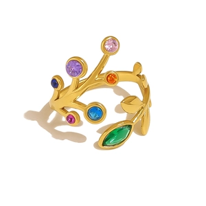 Detail view of 18K gold leaf ring with colorful round and marquise-cut zircons