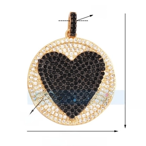 Detailed view of heart pendant with black and white zircons, measuring 34mm by 25mm