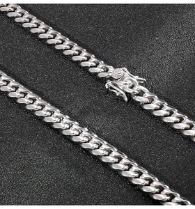 Macro shot of 8mm stainless steel curb chain with secure double clasp mechanism