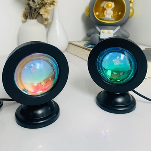 Sunset projection lamp with RGB color changing effect and round black base stand