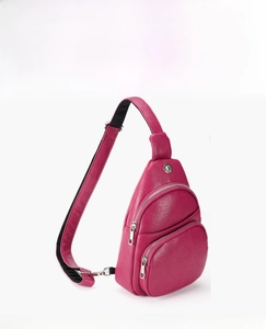 Close-up of rose red lychee grain PU leather sling bag with headphone jack and silver zipper
