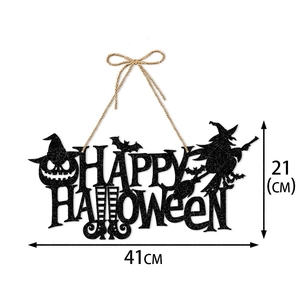 Detail of Happy Halloween door sign with pumpkin, bat and witch elements in black glitter