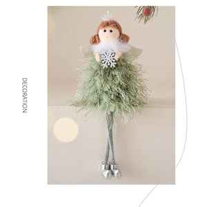 Detail view of a long-legged Christmas angel doll with green fabric and silver crown