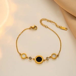 Elegant 18KGP gold bracelet featuring Roman numeral discs, pearls, and crystals for women