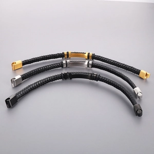 Three braided leather bracelets with gold, silver, and black metal magnetic buckles