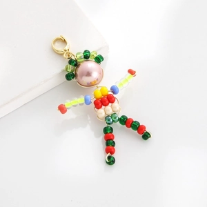 Handmade colorful beaded doll pendant with pink pearl head and gold lobster clasp