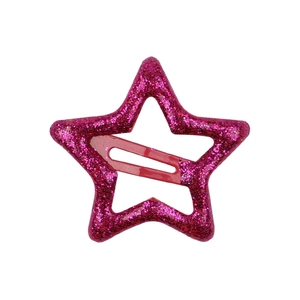 Macro detail of rose pink star hair clip with glittering surface and back metal grip