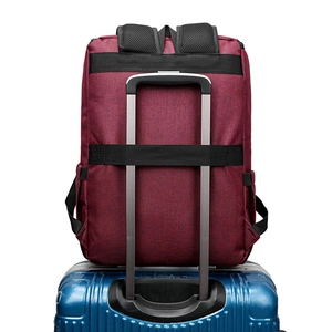 Detail view of the luggage strap on the back of this burgundy oxford cloth laptop backpack