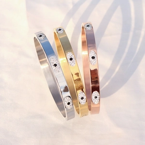 Evil eye stainless steel bangles with diamonds in silver gold and rose gold colors