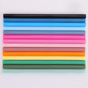 Detailed view of 15 colorful Tritan reusable straws measuring 1cm by 20cm each