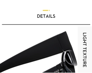 Close-up of sleek black oval sunglasses featuring a wide temple and light texture frame