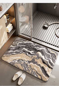Detailed close-up of marble pattern bathroom mat with soft absorbent flocking texture