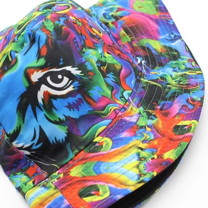 Colorful tie-dye bucket hat with artistic tiger eye print and reinforced stitched brim
