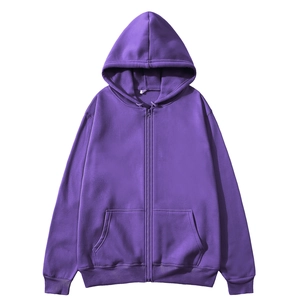 Detail view of purple zip-up hoodie featuring ribbed cuffs and front kangaroo pockets