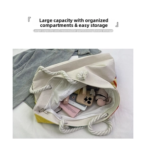 Spacious canvas tote bag with thick cotton rope handles showing daily essentials storage