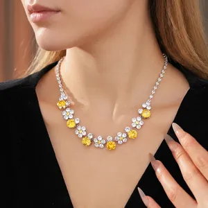 Luxury silver flower necklace with large yellow gemstones and brilliant white zircon pavé
