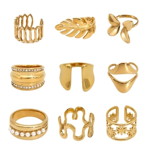 Nine-piece gold ring set featuring pearls, rhinestones, and varied minimalist designs
