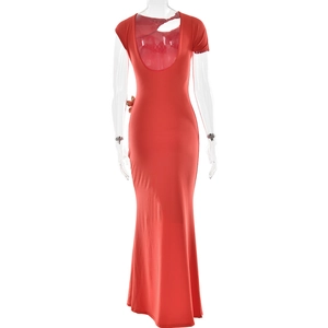 Detail of red backless sleeveless maxi dress with mermaid hem on transparent mannequin