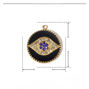 Detailed view of evil eye heart pendant in gold and blue with 18mm size markings