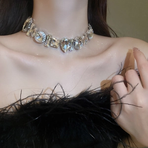 Detailed close-up of crystal choker necklace with mixed round and marquise diamond cuts