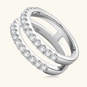 Macro shot of silver dual-layer ring showing D0.16 engraving and fine diamond pavé