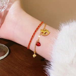 Bracelet double couche plaqué or 18 carats avec cordon rouge et pendentif cheval