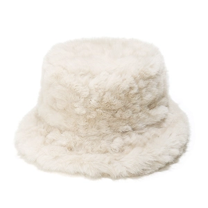 Detailed view of plush faux fur texture on a cream-white winter bucket hat