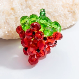 Handmade strawberry fruit pendant with faceted red crystal glass beads and green leaf loop